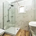 Amoudi Studios Apartments Hotel アモウディ